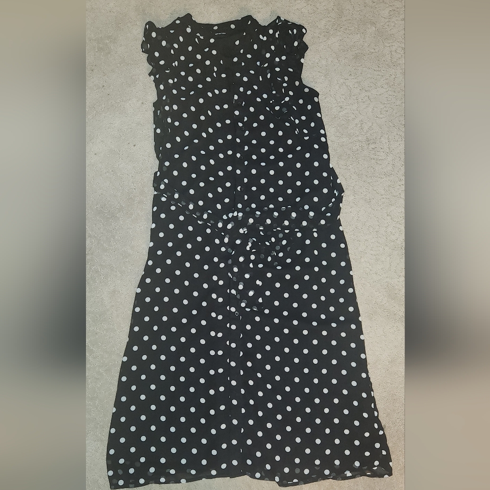 Long black polka dot button down dress.